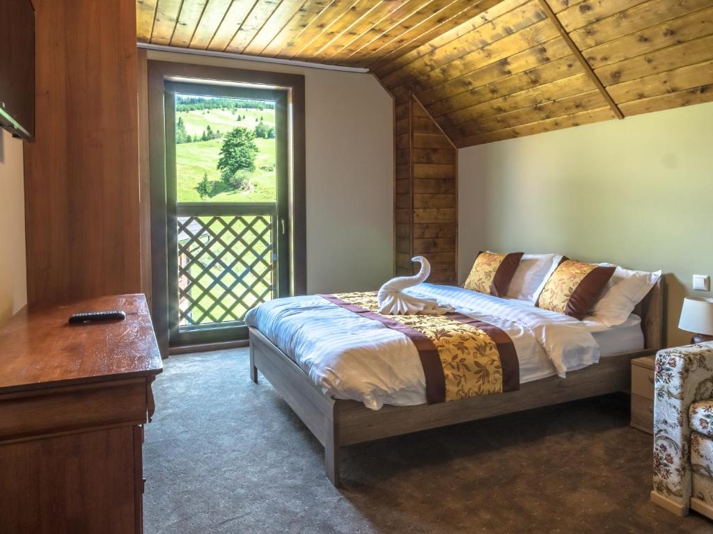 Postel nebo postele na pokoji v ubytování Spring Chalet