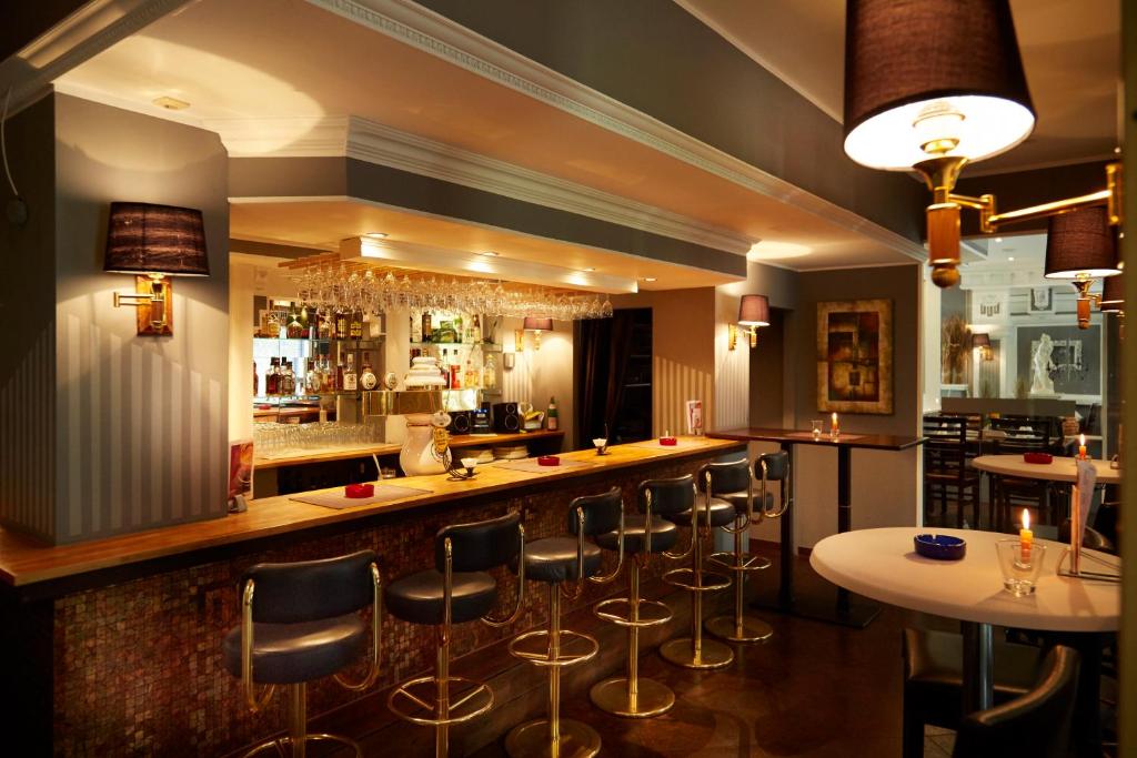 Lounge nebo bar v ubytování Hotel Plöner See by Tulip Inn