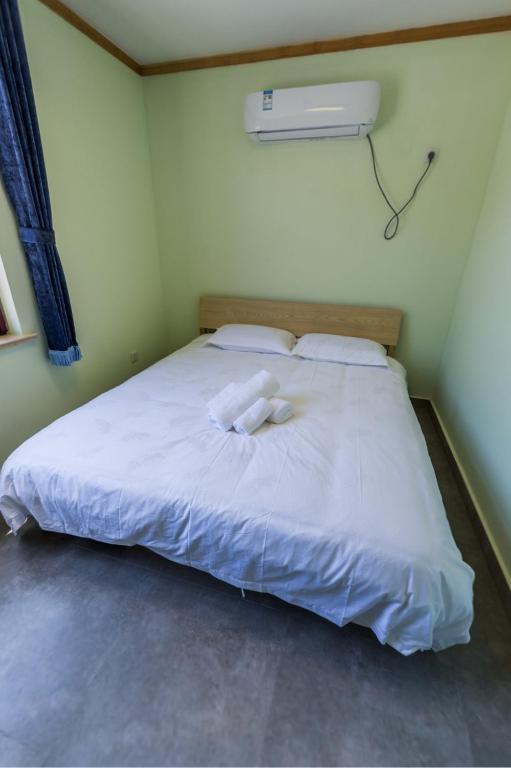 Postel nebo postele na pokoji v ubytování Chez Ina & Jasee