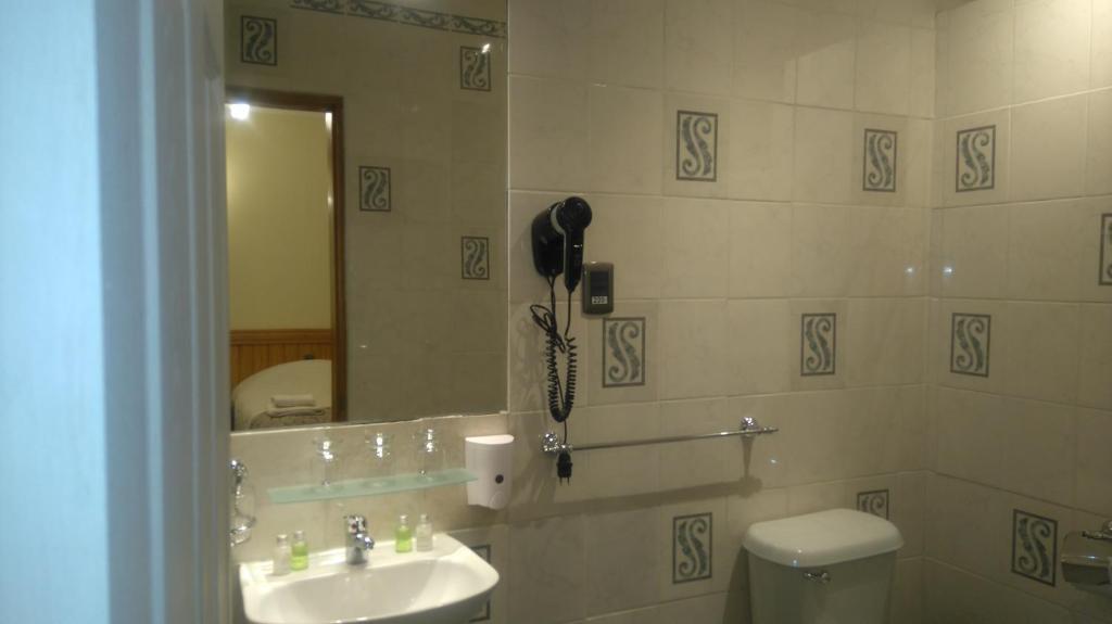 Uma casa de banho em Hostal Loreto Belen