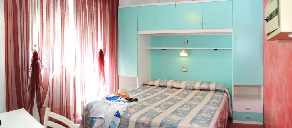 Postel nebo postele na pokoji v ubytování Hotel Fortuna