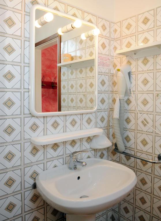 Koupelna v ubytování Hotel Fortuna