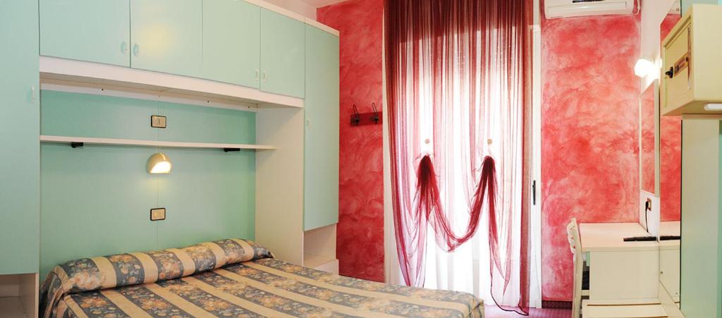Postel nebo postele na pokoji v ubytování Hotel Fortuna