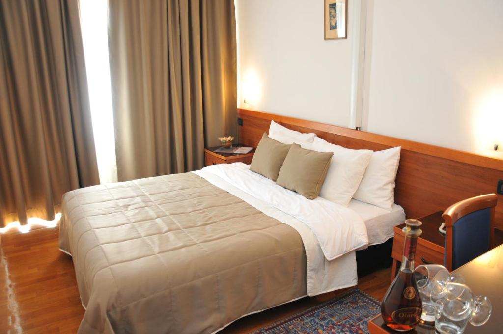 Postel nebo postele na pokoji v ubytování Hotel Terex