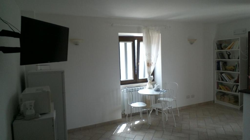 A television and/or entertainment centre at Cominium Benessere
