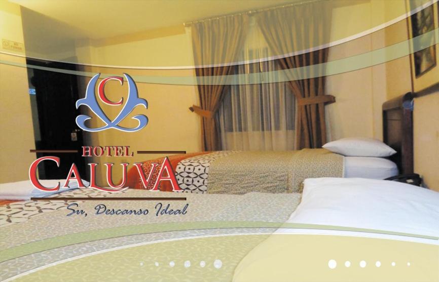 Postel nebo postele na pokoji v ubytování Hotel Caluva
