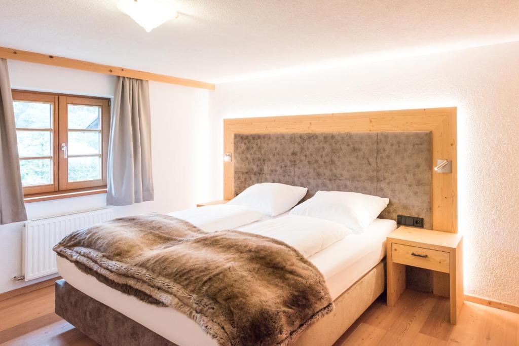 Postel nebo postele na pokoji v ubytování Pepi's Landhaus