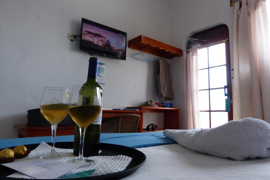 TV a/nebo společenská místnost v ubytování Hotel Coloma Galapagos