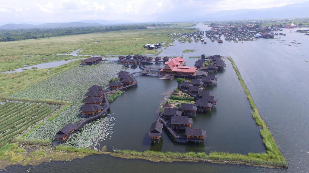 an aerial view of an island in a body of water at Golden Island Cottages Nampan in Ywama