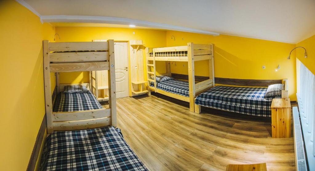 Postel nebo postele na pokoji v ubytování Alina Hotel & Hostel