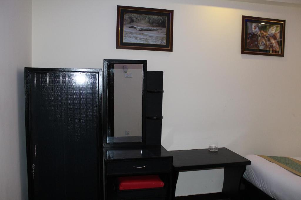 Postel nebo postele na pokoji v ubytování Hotel Gallery Nepal