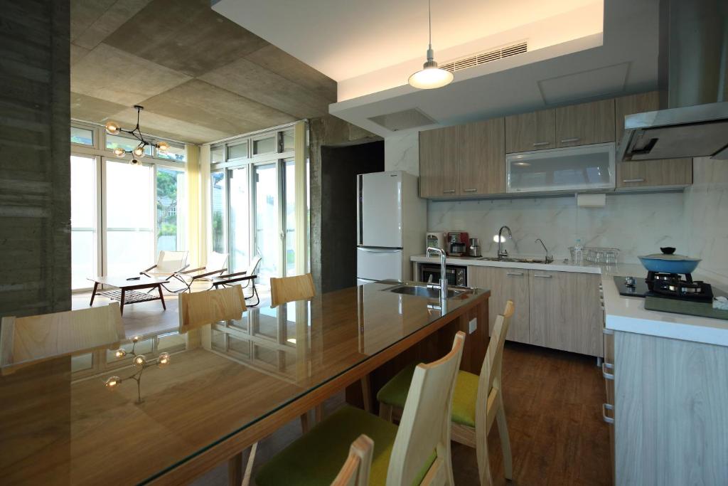 Kuchyň nebo kuchyňský kout v ubytování Chuying Sunrise B&B