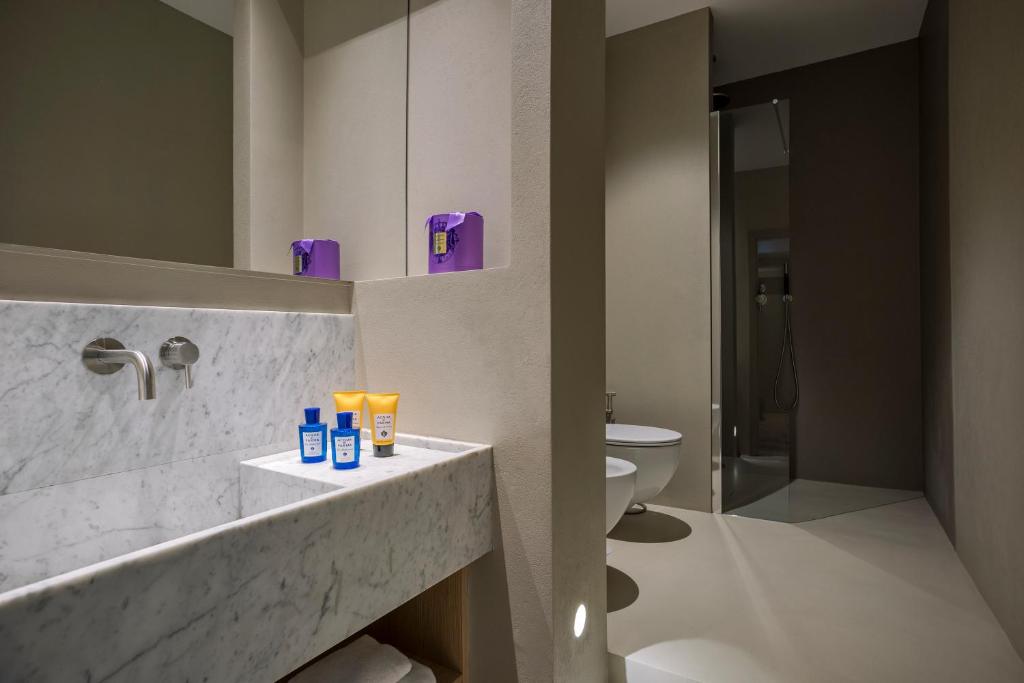 Kúpeľňa v ubytovaní G55 Design Hotel