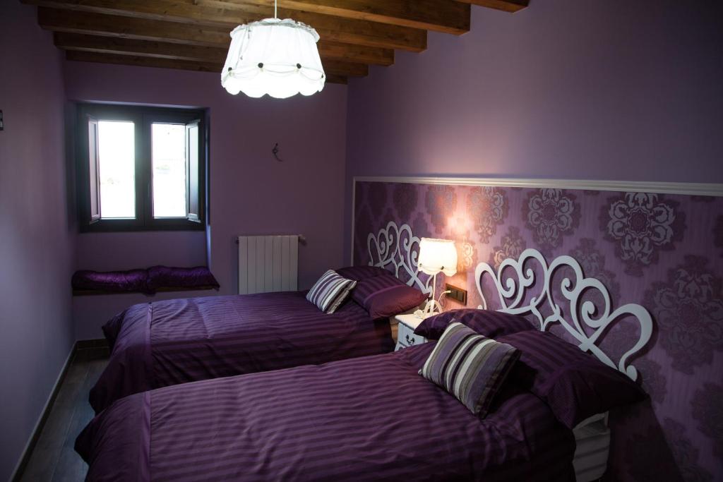 Posteľ alebo postele v izbe v ubytovaní Casa Rural el Ribero I