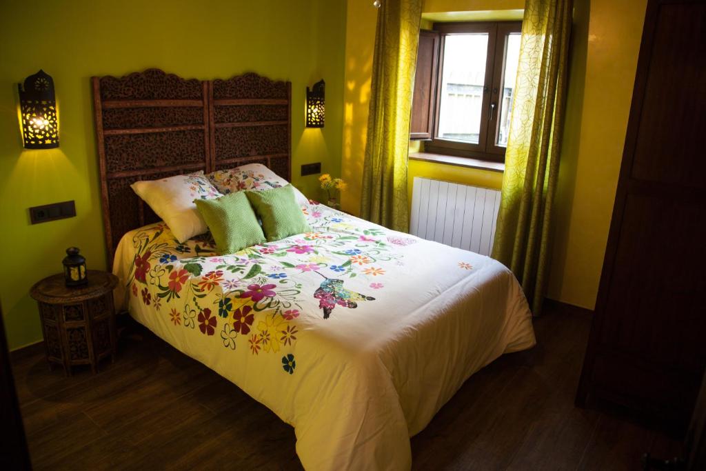 Posteľ alebo postele v izbe v ubytovaní Casa Rural el Ribero I