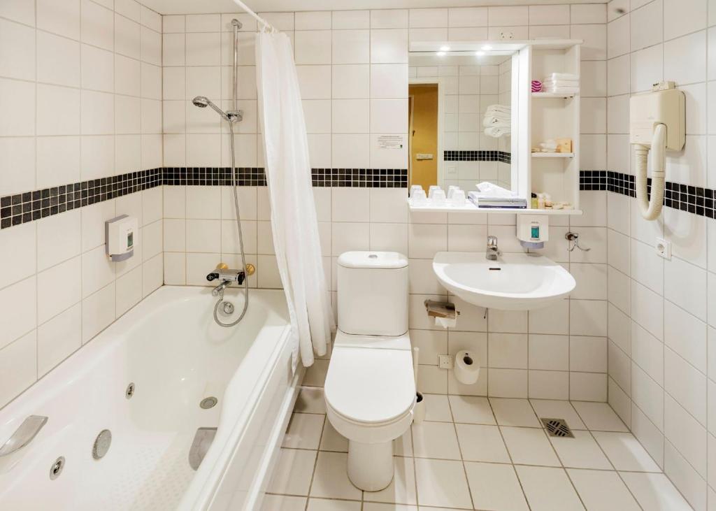 Baðherbergi á Fosshotel Rauðará