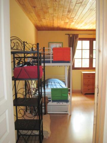 Postel nebo postele na pokoji v ubytování Le Ribet