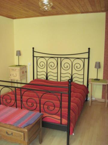 Postel nebo postele na pokoji v ubytování Le Ribet
