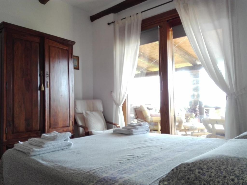 A bed or beds in a room at Il Vigneto