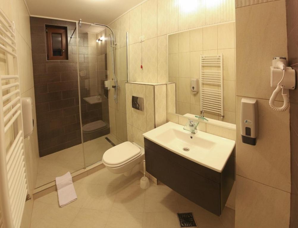 Koupelna v ubytování Allegria Hotel