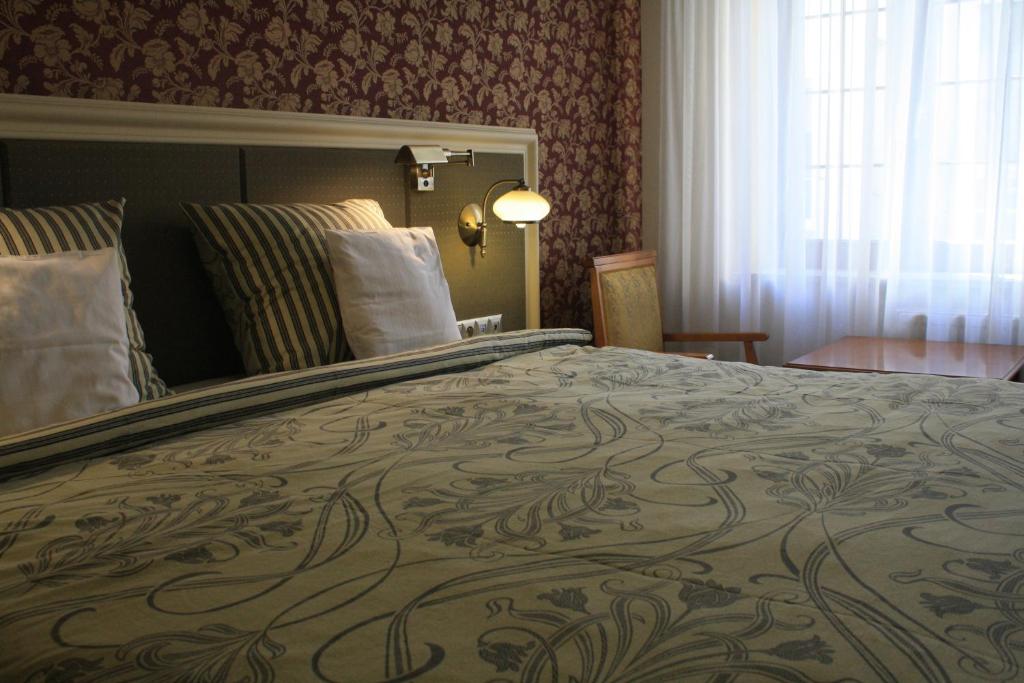 Postel nebo postele na pokoji v ubytování Hotel Petite Fleur - Adults only ! Air-Conditioning !