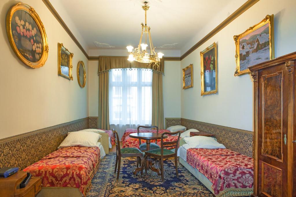 Posteľ alebo postele v izbe v ubytovaní Metropolitan Apartments