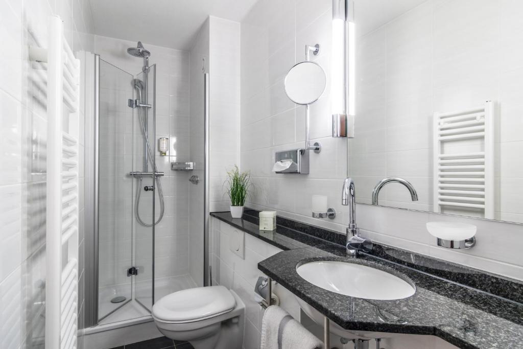 Koupelna v ubytování Hotel Garni Oberrhein