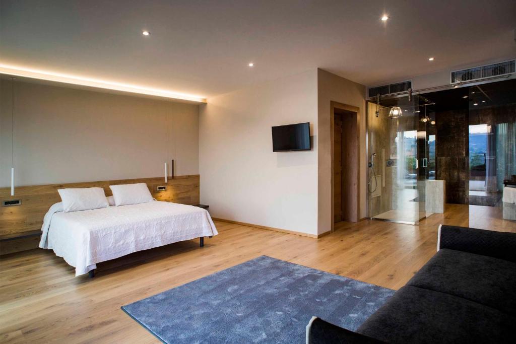 Postel nebo postele na pokoji v ubytování Hotel Ristorante La Rosina