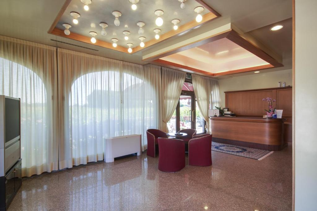 Posezení v ubytování Park Hotel Ristorante Ca' Bianca
