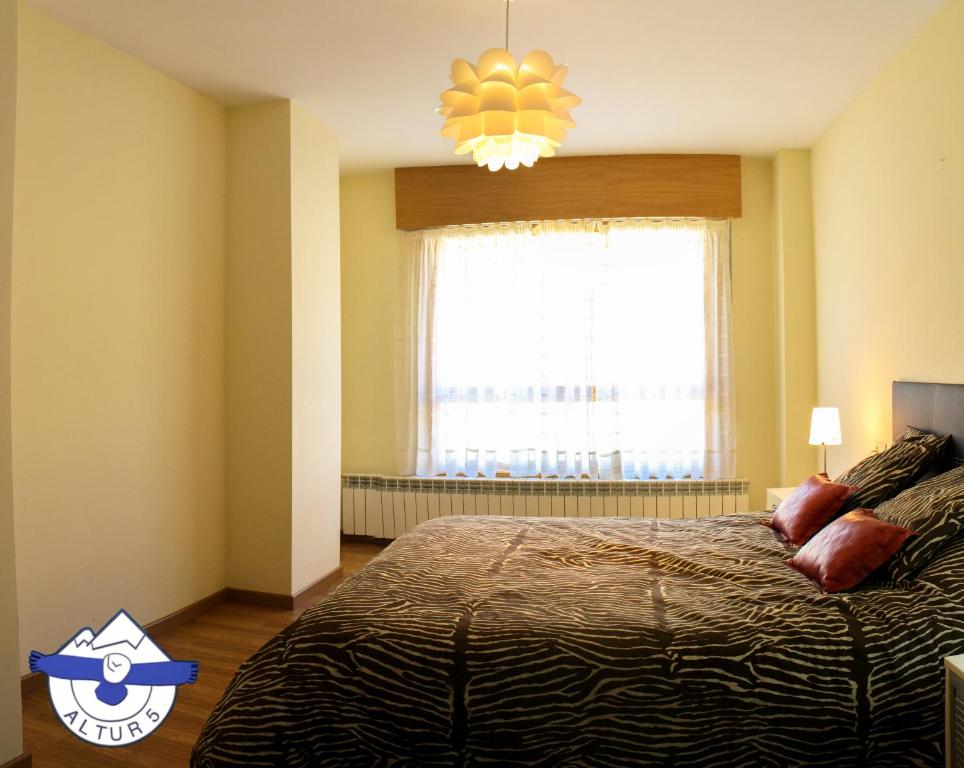 Postel nebo postele na pokoji v ubytování Altur 5 Jaca