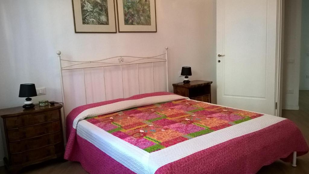 מיטה או מיטות בחדר ב-Appartamento Venezia Lido