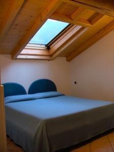 Postel nebo postele na pokoji v ubytování Residence Antico Crotto