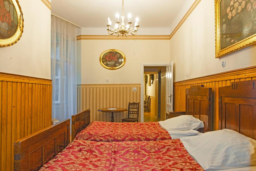 Posteľ alebo postele v izbe v ubytovaní Metropolitan Apartments