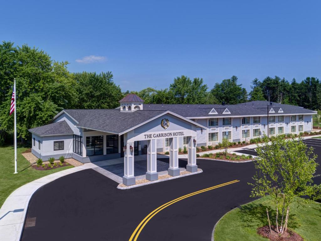 a rendering of the inn at the park at The Garrison Hotel & Suites Dover-Durham, Ascend Hotel Collection in Dover