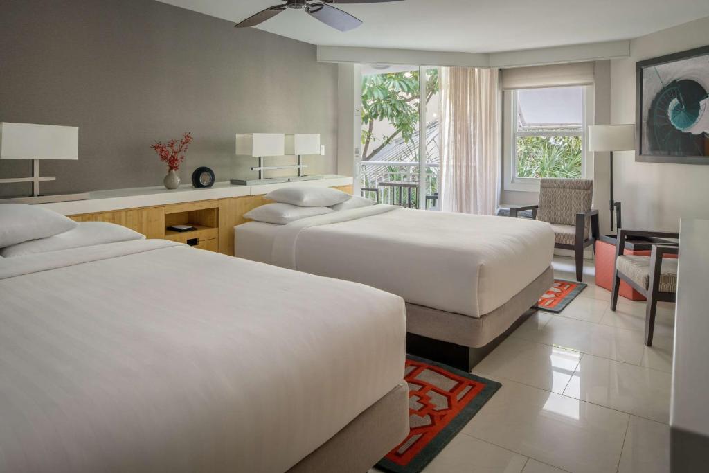 Postel nebo postele na pokoji v ubytování Hyatt Centric Key West Resort & Spa
