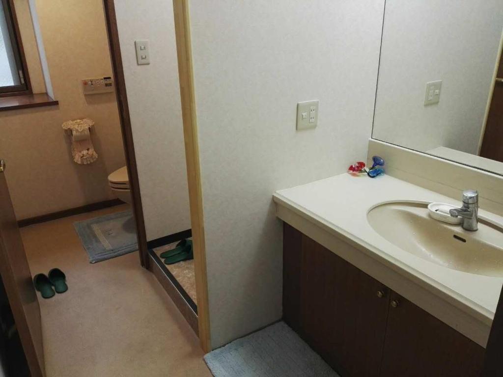 Koupelna v ubytování Atami Onsen Guest House Megumi