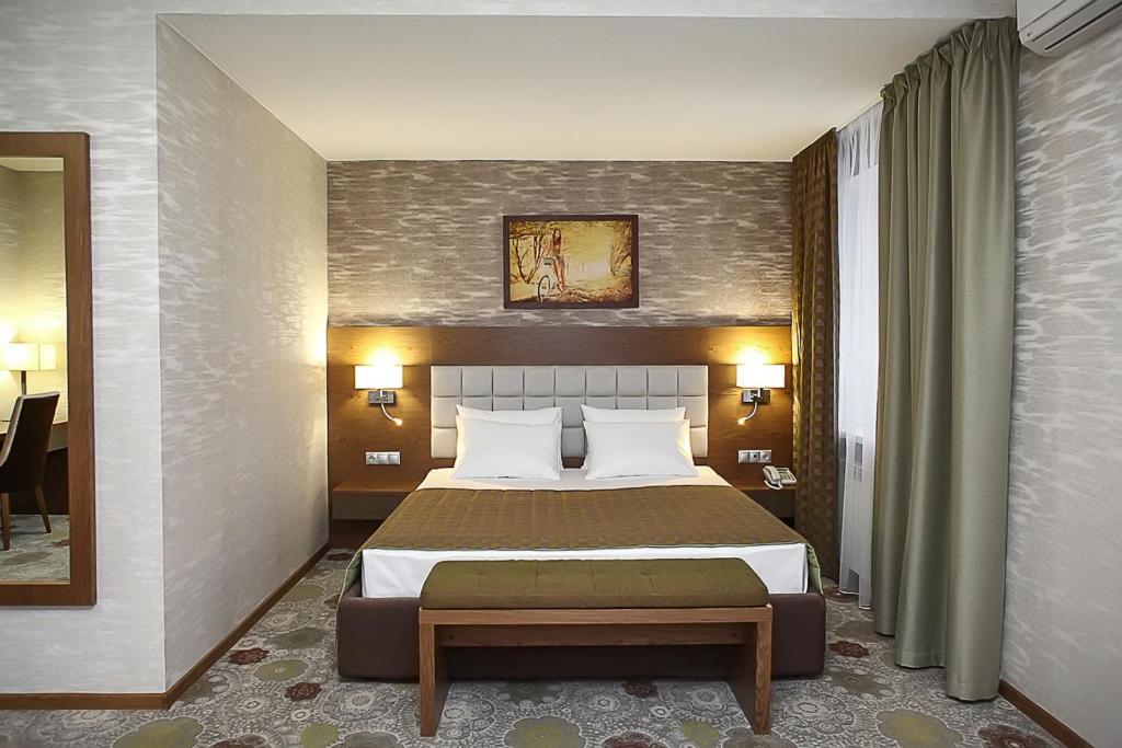  Кровать или кровати в номере "Bon Apart Hotel" 