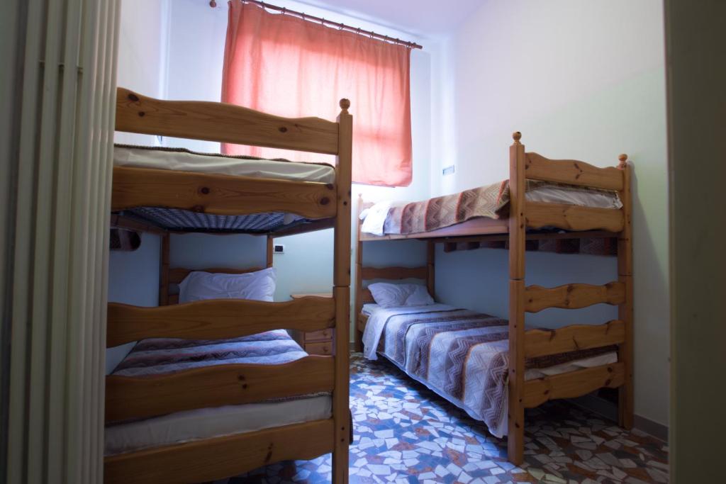 Postel nebo postele na pokoji v ubytování Ostello di Vicenza