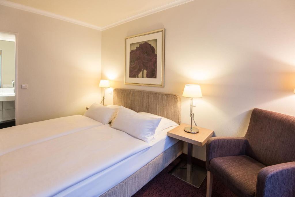 Postel nebo postele na pokoji v ubytování Best Western Hotel Hamburg International