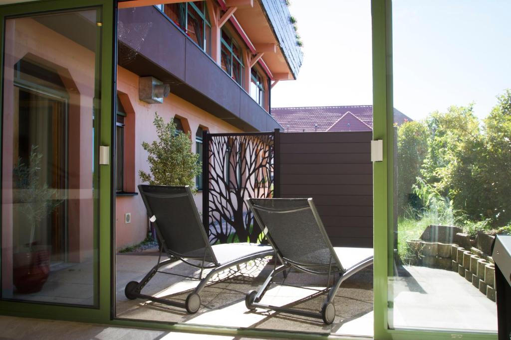Balkón nebo terasa v ubytování Hôtel Le Ménestrel