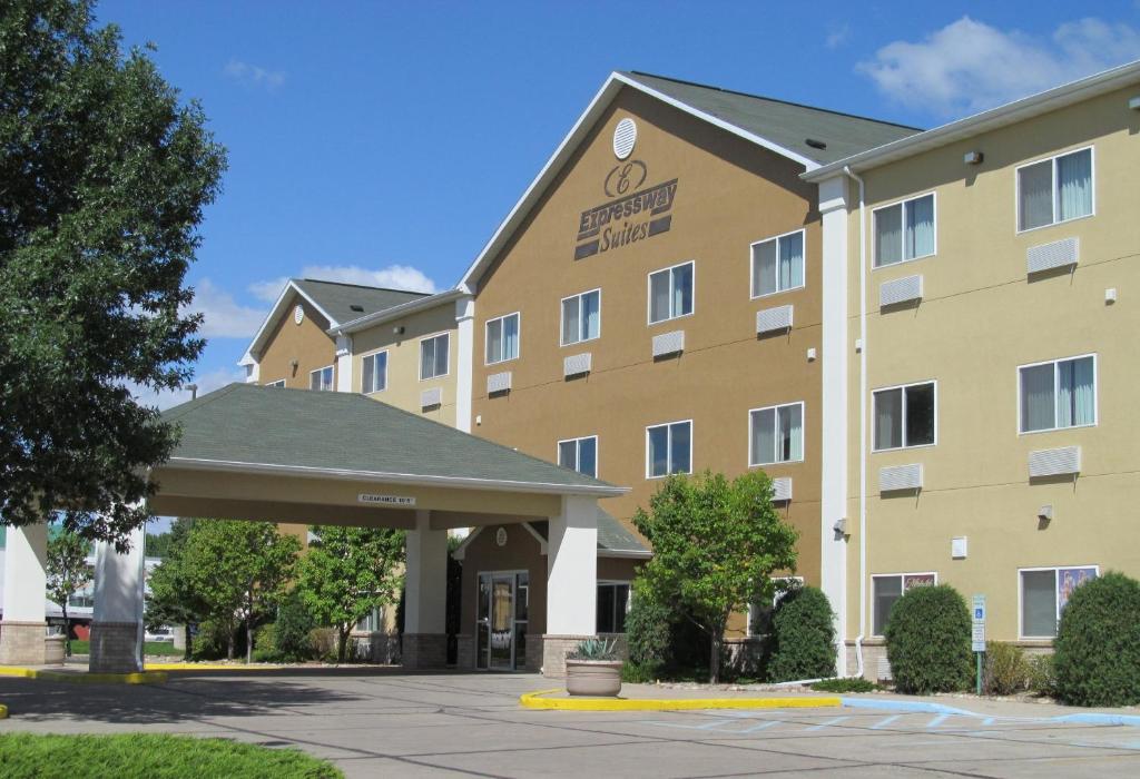 a rendering of a hotel with a parking lot at EverSpring Suites in Bismarck