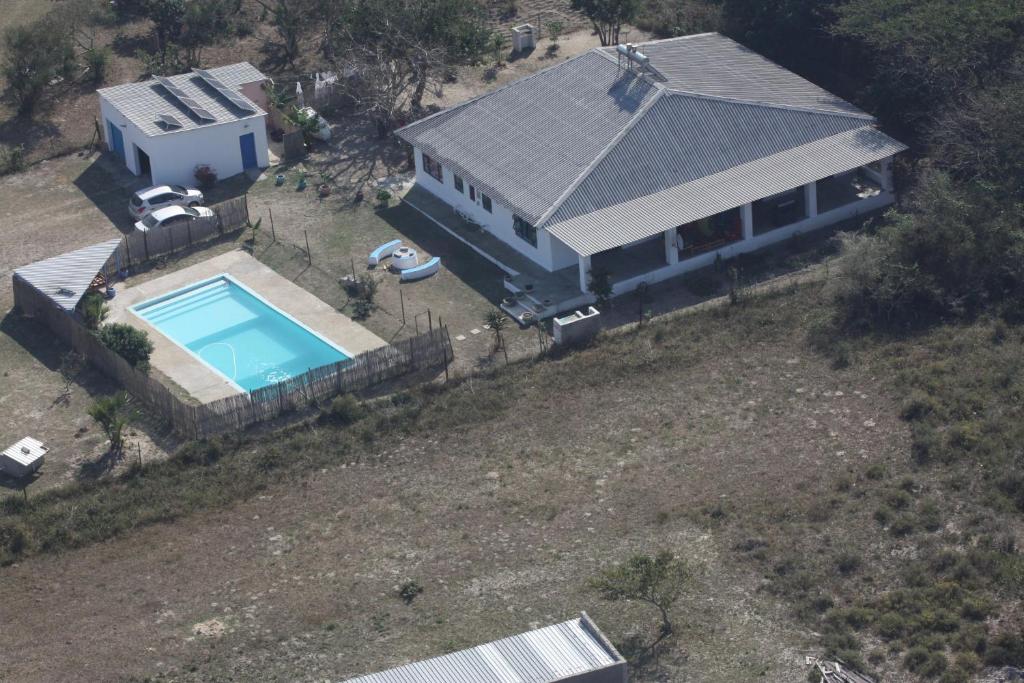 an aerial view of a house with a swimming pool at Lala Kahle in Sodwana Bay