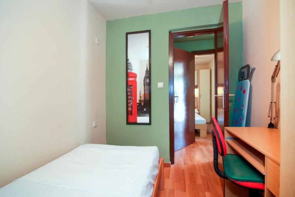 Posteľ alebo postele v izbe v ubytovaní tiho's apartments