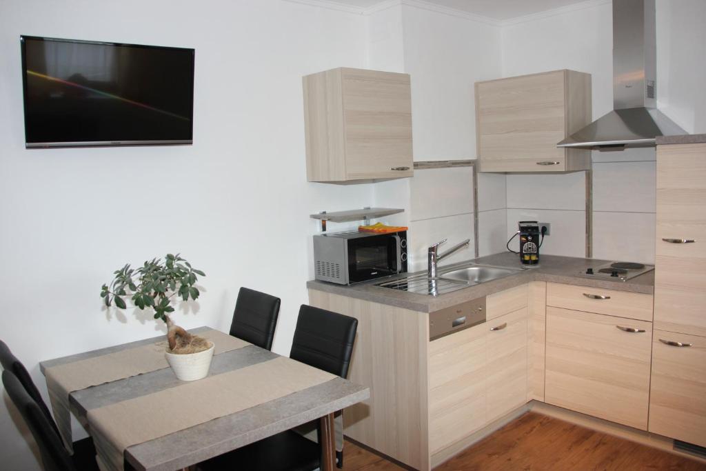 Kuchyň nebo kuchyňský kout v ubytování Apartment Warmuth