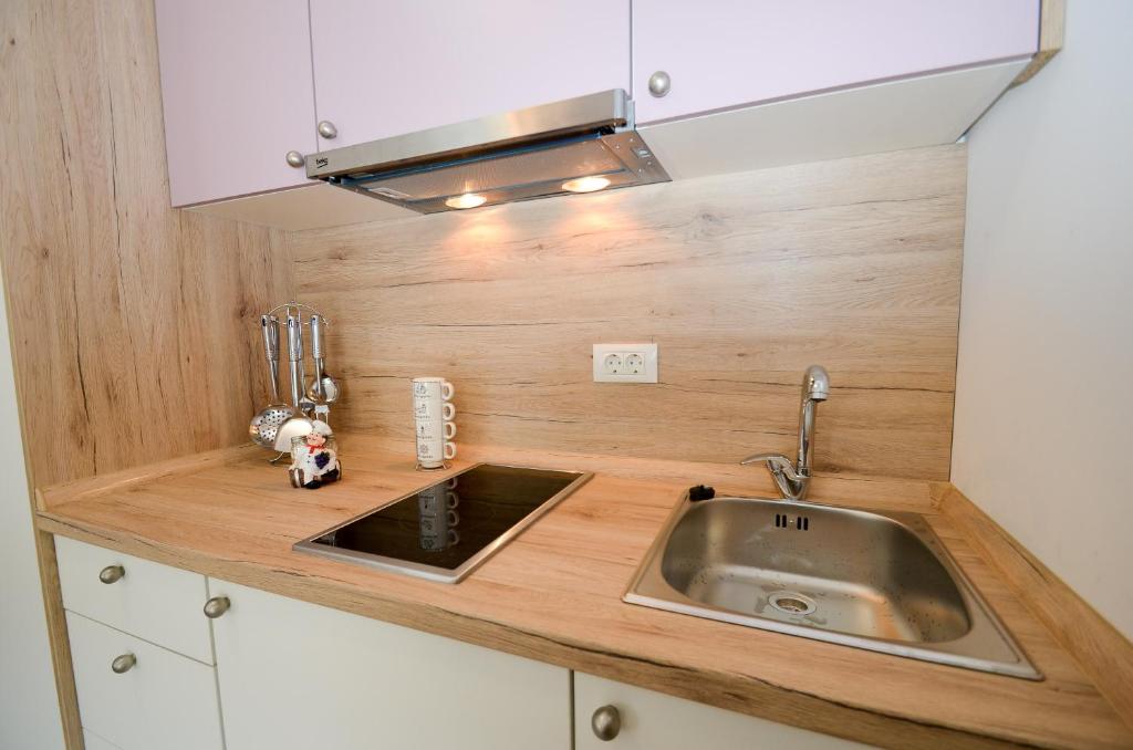 Kuchyň nebo kuchyňský kout v ubytování Guesthouse Grotta Di Nicola