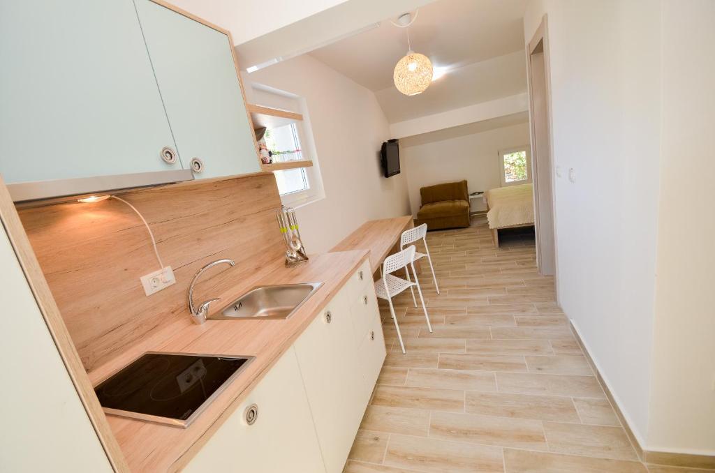 Kuchyň nebo kuchyňský kout v ubytování Guesthouse Grotta Di Nicola