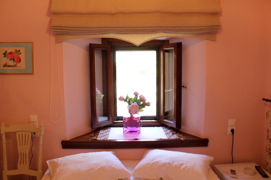 Posteľ alebo postele v izbe v ubytovaní Guesthouse Kleopatra's