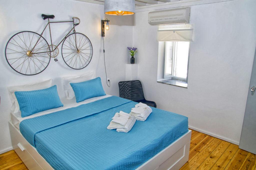 Postel nebo postele na pokoji v ubytování Lindos Tholos Villa