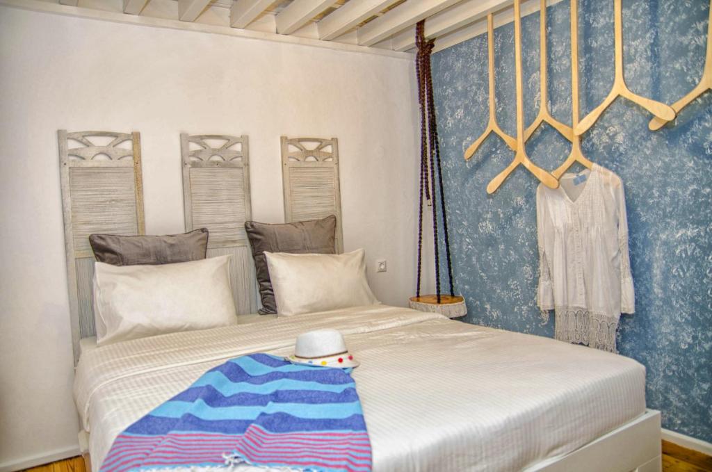 Postel nebo postele na pokoji v ubytování Lindos Tholos Villa