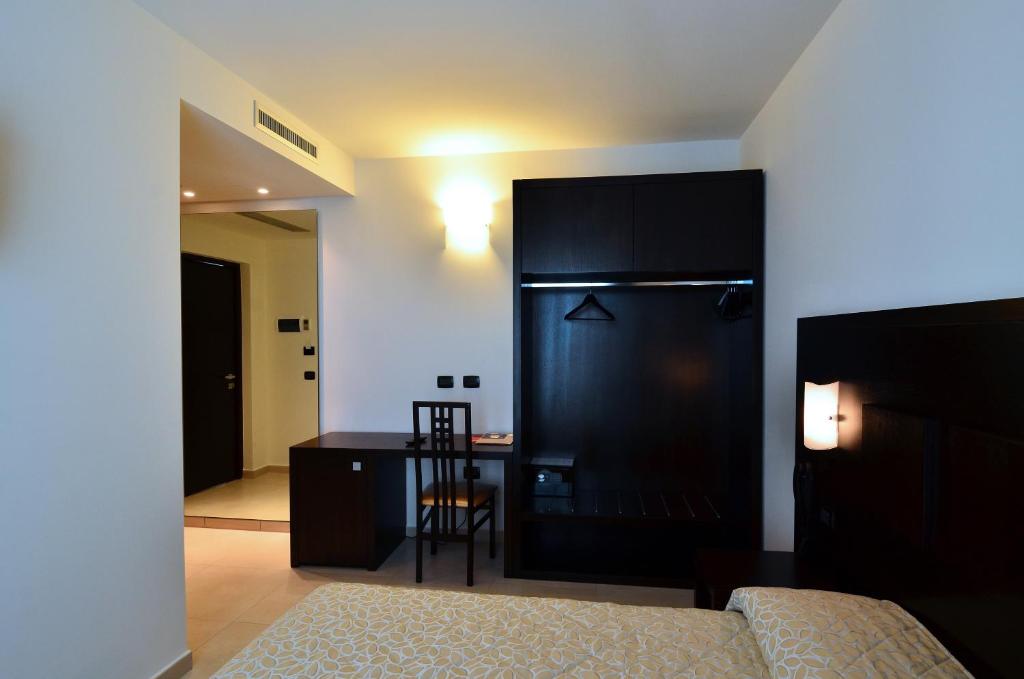 Postel nebo postele na pokoji v ubytování Hotel I Crespi